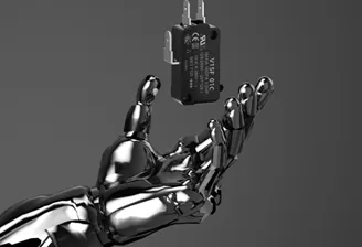 Why do the same microswitches have such different lifespans in AC/DC environments?